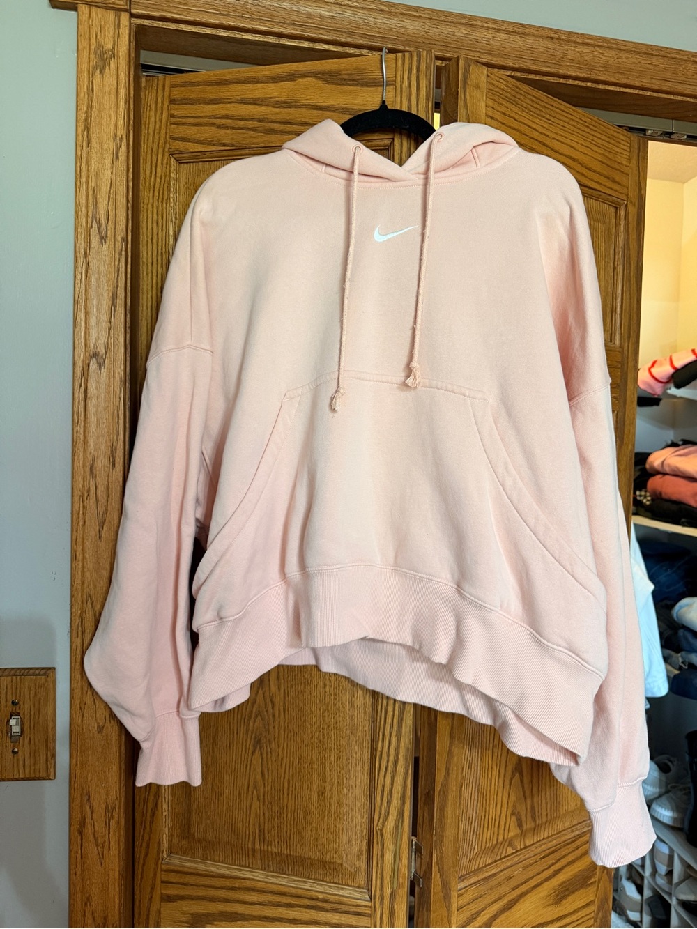 Nike Women's Light Pink Cropped Hoodie with White Swoosh